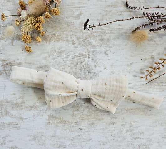 Noeud papillon blanc et pois dorés