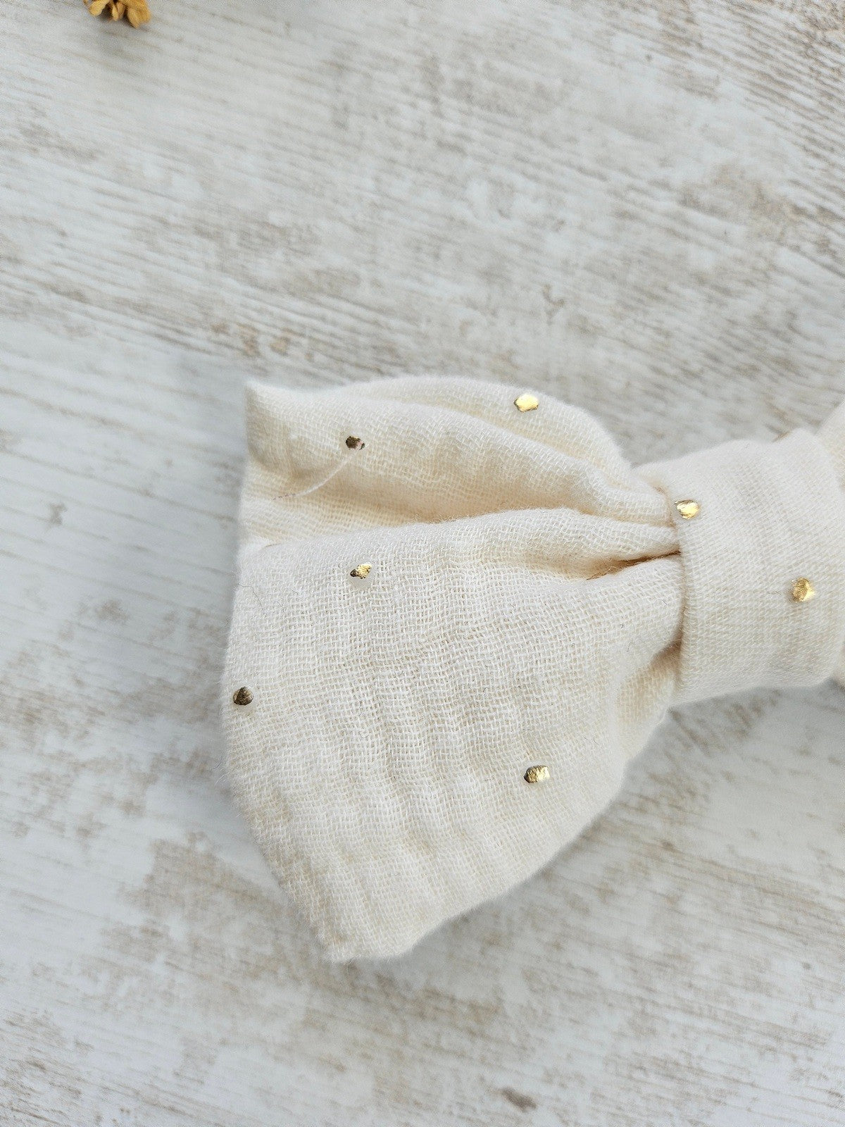 Barrette noeud papillon blanc et pois dorés