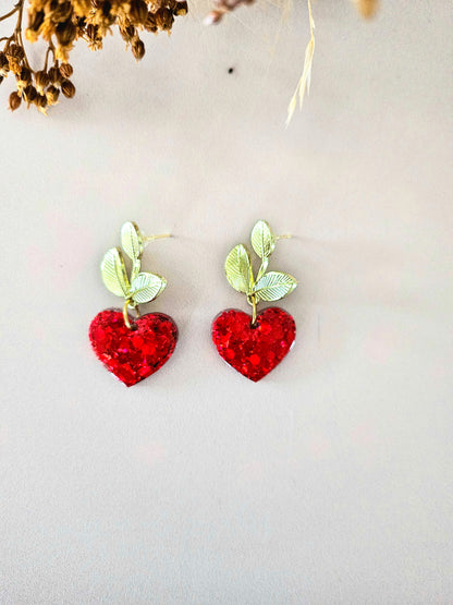 Boucles d’oreilles feuilles dorées & pendentif cœur en résine