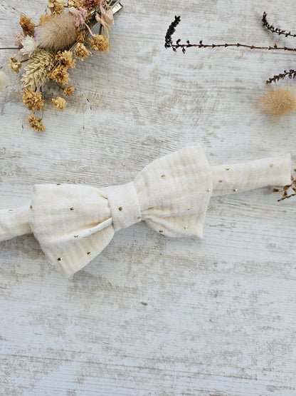 Noeud papillon blanc et pois dorés